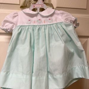 Worn once. Good as new. Mint color dress for newborn.